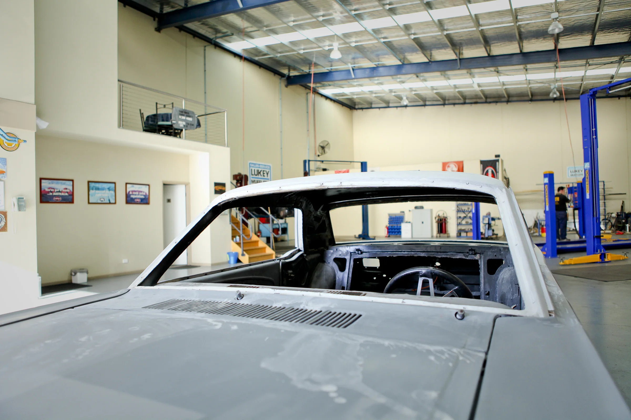 A classic car being worked on in the ATR workshop